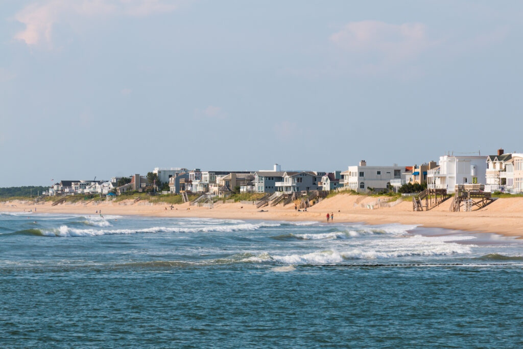 Homes line the Virginia Beach shore near the boardwalk and Rudee Inlet.